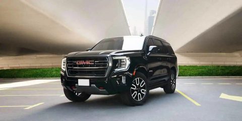 GMC Yukon Denali at4 for rent in Dubai, bold black SUV, powerful SUV, full comprehensive insurance, no deposit