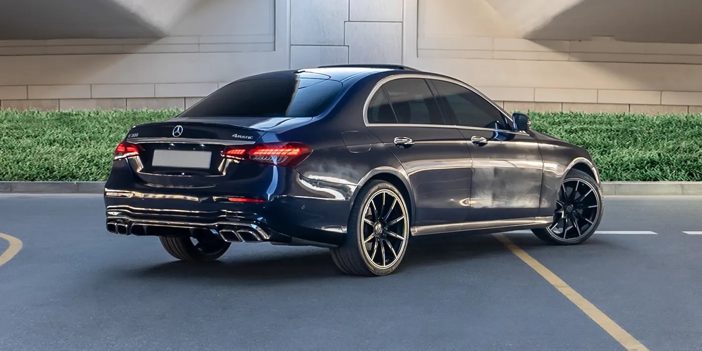 1690554451Mercedes-Benz-E300-Rental-Dark-BLue-1 Mercedes Car Rental Dubai and Abu Dhabi - rent a car Exotic cars for rent - Mercedes G Class - S Class - C Class - GLE Coupe GLE 63 S - S500 Brabus Rocket G800 - Cheap affordable luxury premium cars for rent DUbai from Volcoar
