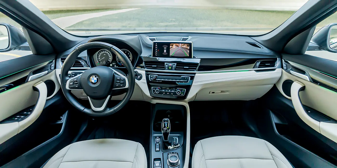 1696325040BMW-X1-Rental (3) BMW X1 rent a car in Dubai and Abu Dhabi - car rental made easy automatic transmision cheap family SUV in Dubai from Volocar