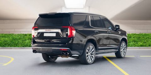 GMC Yukon Denali for rent in Dubai, bold black SUV, powerful SUV, full comprehensive insurance, no deposit