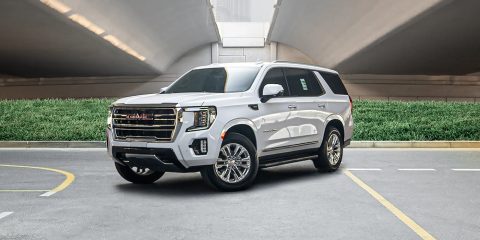 GMC Yukon Denali at4 for rent in Dubai, bold black SUV, powerful SUV, full comprehensive insurance, no deposit
