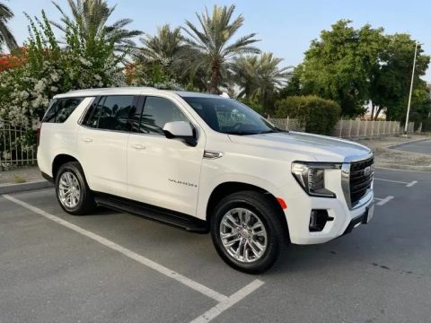 GMC Yukon Denali at4 for rent in Dubai, bold black SUV, powerful SUV, full comprehensive insurance, no deposit